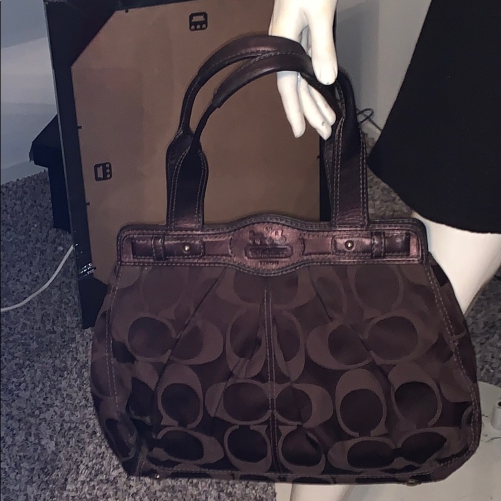 Coach Signature dark brown purse.